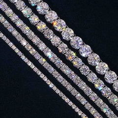 925 Sterling Silver Moissanite Tennis Chain – Iced Out VVS Moissanite 3mm-4mm Bracelet & Necklace

Experience luxury with the Top Icy HHMCT003 Moissanite Tennis Chain. Made from 925 sterling silver and featuring VVS Moissanite stones, this exquisite tennis bracelet/necklace is the perfect statement piece. The oval-cut Moissanite stones, renowned for their brilliance, are set using micro insert technology, ensuring maximum sparkle and durability.

Whether you're looking for a 3mm or 4mm width, this tennis ch