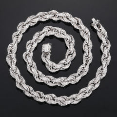 Take your ice game to the next level with the TOP ICY 8mm Fully Iced Out Rope Chain Necklace and Link Bracelet Set — the perfect combo for bold, unmissable style. Expertly crafted from genuine 925 sterling silver and dripping in VVS moissanite stones, this set delivers undeniable shine that passes diamond testers and outperforms traditional bling.

Featuring a unique rope chain design with a spring clasp, each piece is meticulously micro-inlaid with oval-cut moissanite stones that radiate with fire and bril